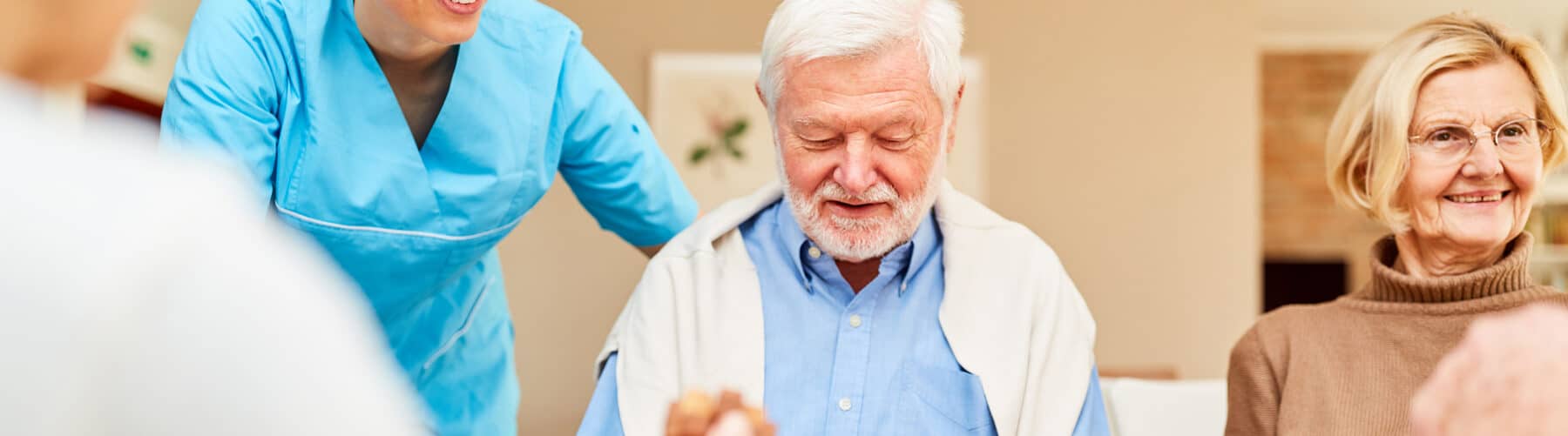 older people enjoying themselves at the table